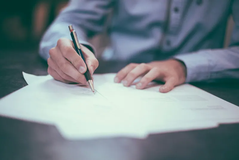 Employer reviewing payroll certificates before an EMP501 reconciliation submission